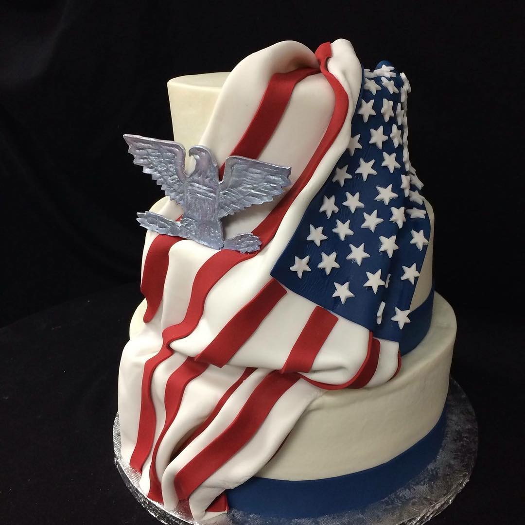 American flag draped patriotic cake