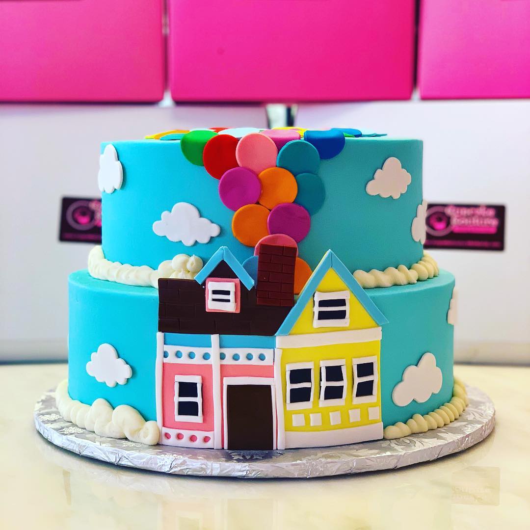 Up movie themed birthday cake with balloons